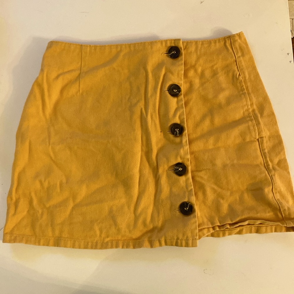 Large children’s miniskirt yellow, button up with pockets